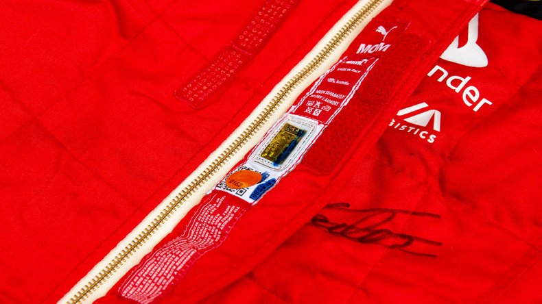 Broad Arrow Auctions | Charles Leclerc 2023 Signed Original Ferrari Overalls