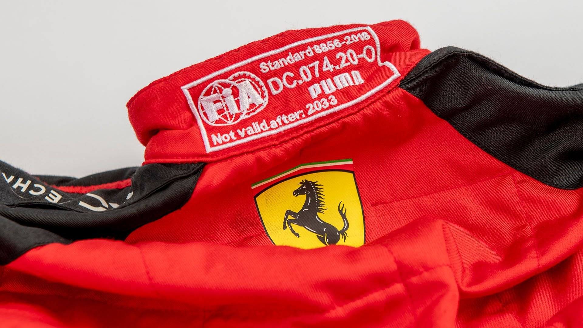 Broad Arrow Auctions | Charles Leclerc 2023 Signed Original Ferrari Overalls