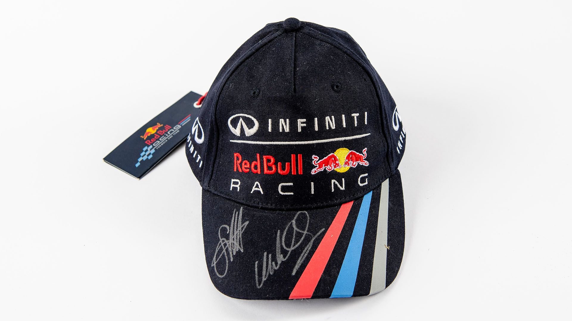 Broad Arrow Auctions | Red Bull Baseball Cap Signed by Sebastian Vettel and Mark Webber