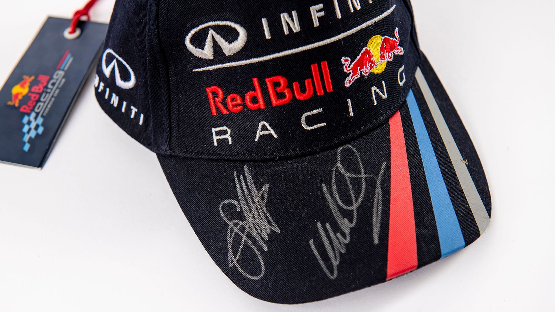 Broad Arrow Auctions | Red Bull Baseball Cap Signed by Sebastian Vettel and Mark Webber