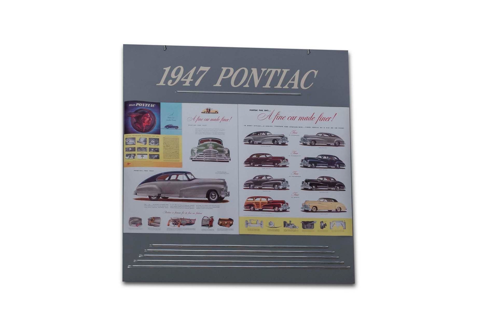 Broad Arrow Auctions | '1947 Pontiac Model Line Display Hanging Sign