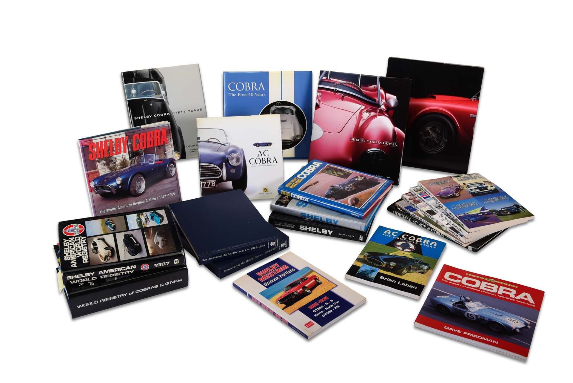 Broad Arrow Auctions | Group Lot of Shelby and Cobra Books including the SAAC Registry and Books by Colin Comer