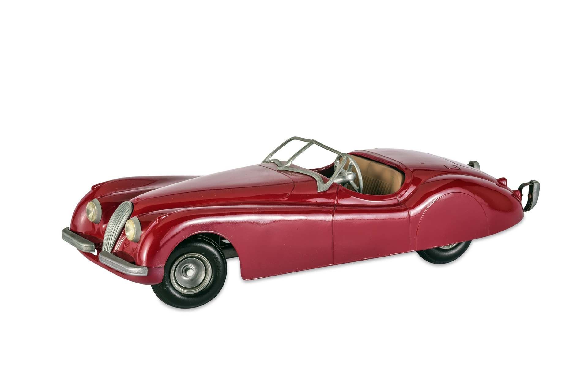 Broad Arrow Auctions | Doepke Toys 'Jaguar XK120 1950s' 17-inch toy car, Claret
