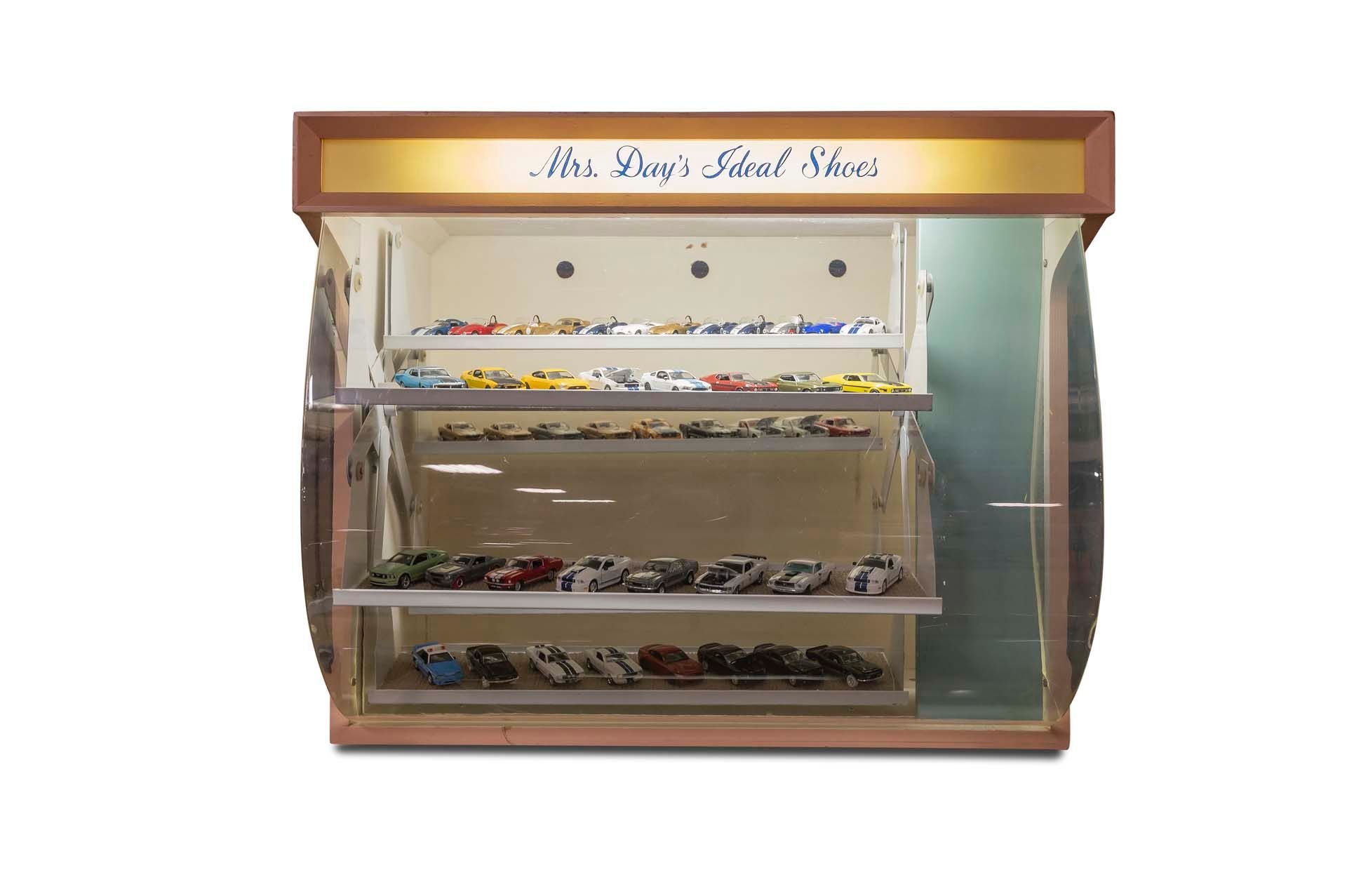 For Sale Mrs. Days Ideal Shoes Display Case with Large Assortment of Shelby and Cobra Toy Cars
