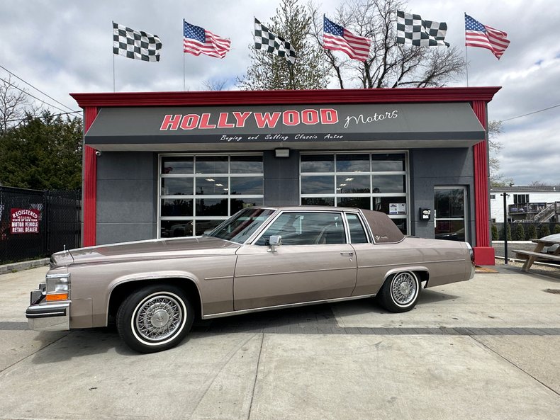 https://cdn.dealeraccelerate.com/hollywoodmotors/1/1424/79938/790x1024/1984-cadillac-deville-2dr-coupe