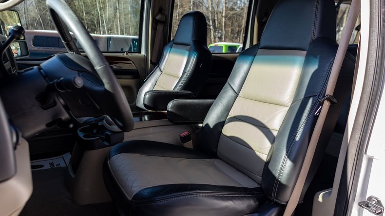 thumbnail image 2 of Richmond Auto Upholstery Driver Side Armrest Cover For 2005 Ford Excursion Eddie Bauer – Charcoal Black With Tan Stitching 2 of 4