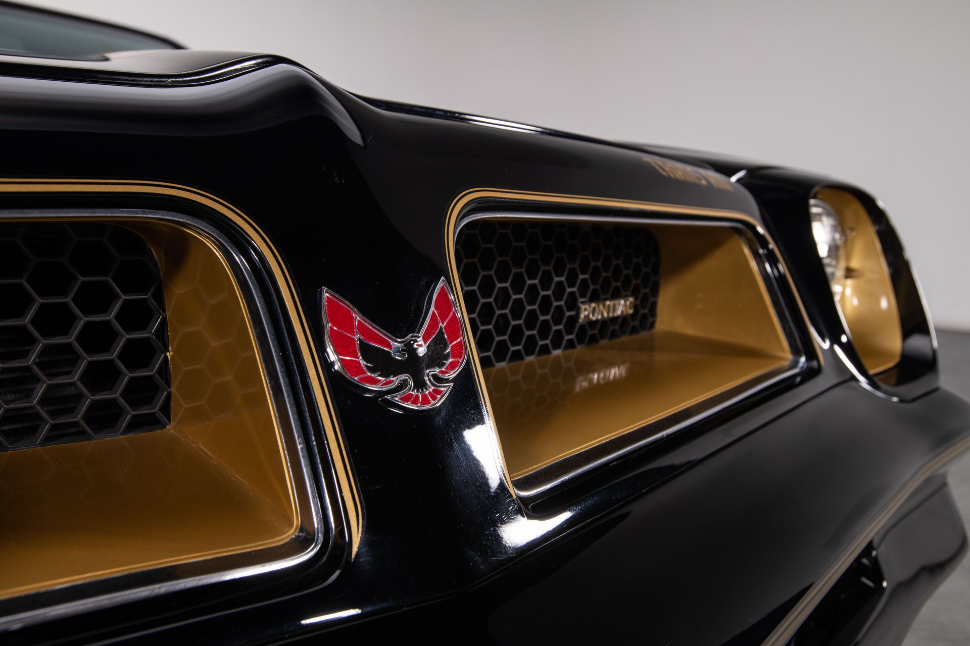 thumbnail image 2 of OER Roof Emblem Set For 1976-1979 Pontiac Firebird & Trans AM - Left & Right - Red/Black 2 of 6