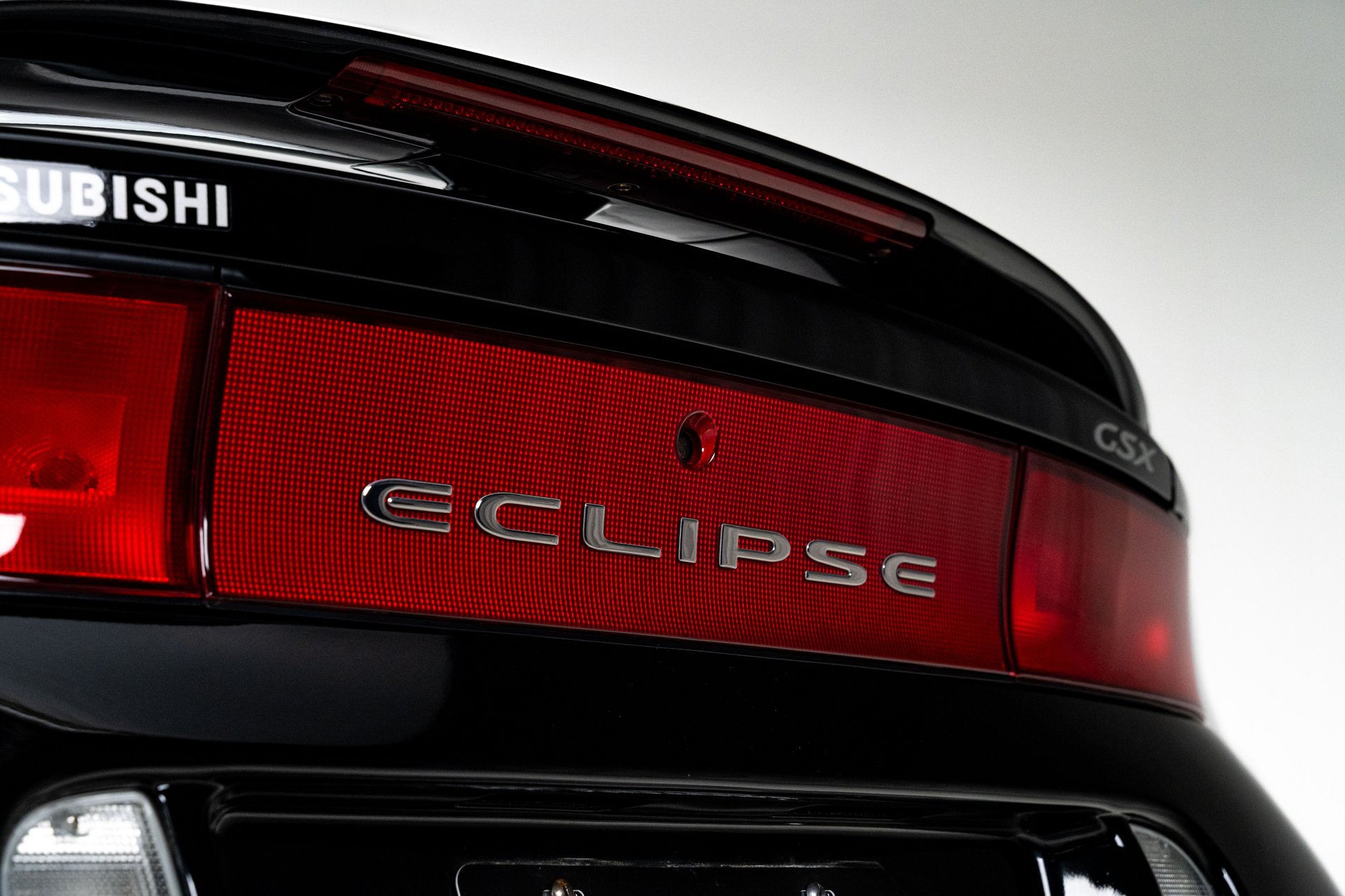 Give Your 95-99 Mitsubishi Eclipse An Instant JDM Style Upgrade With These 3-Piece Black Tail Lights