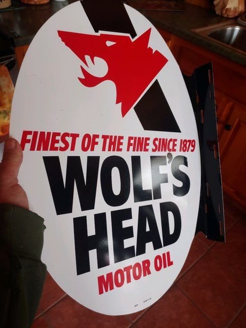  1970s Wolf's Head Flange Sign