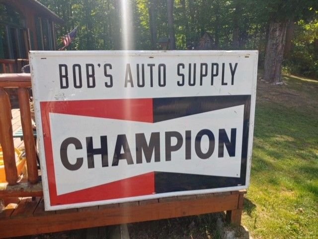  1970s Champion Tin Sign
