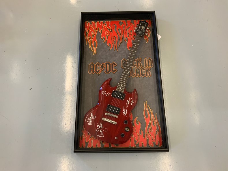 Back N Black AC DC band signed guitar display