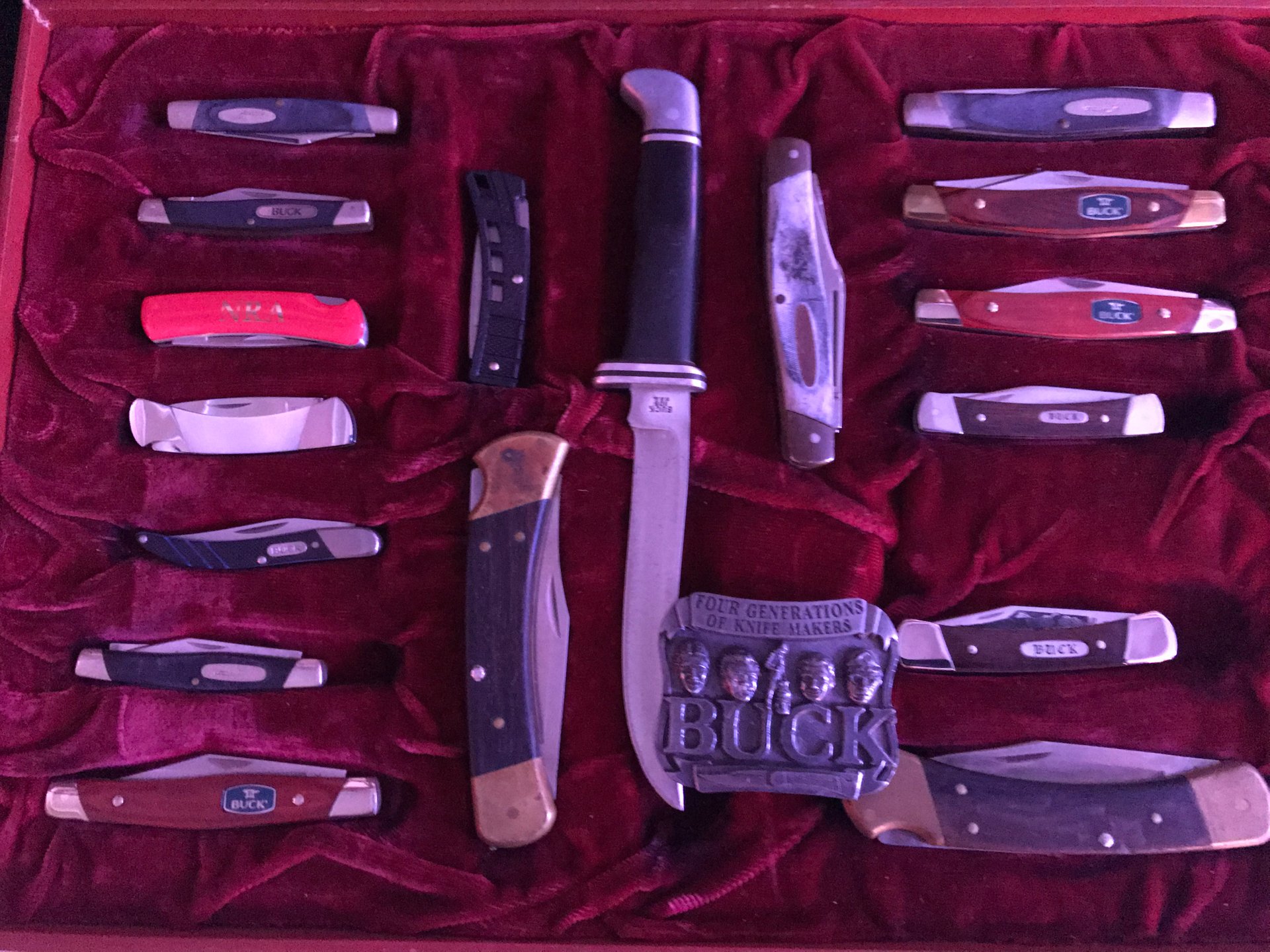 Buck knife collection with super nice display case.