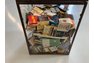 Original old match book collection in glass display cabinet