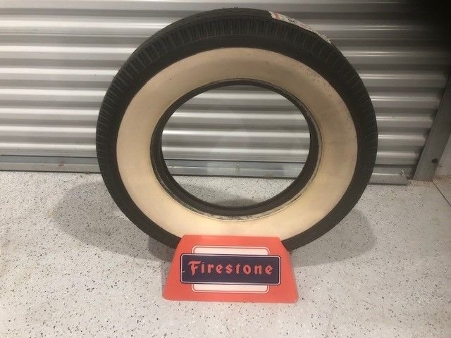 Auction  Collectible Item Firestone Tire and Tire Stand